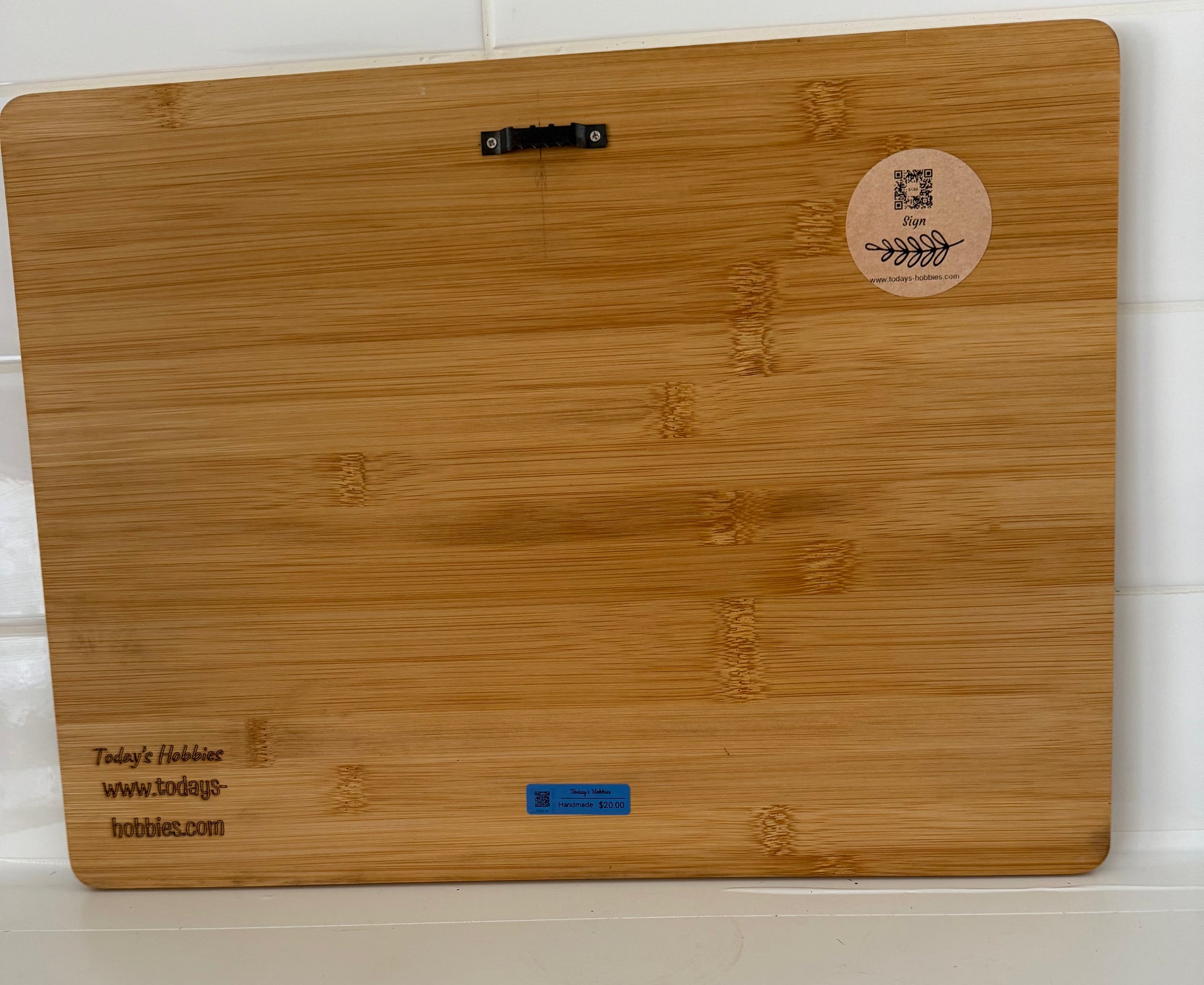Wooden funny Christmas cutting board by Today’s Hobbies with engraved branding and smooth bamboo surface