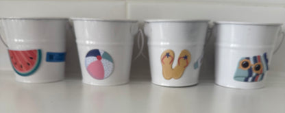 Set of Today’s Hobbies tin containers with summer-themed designs in handcrafted home organizer set